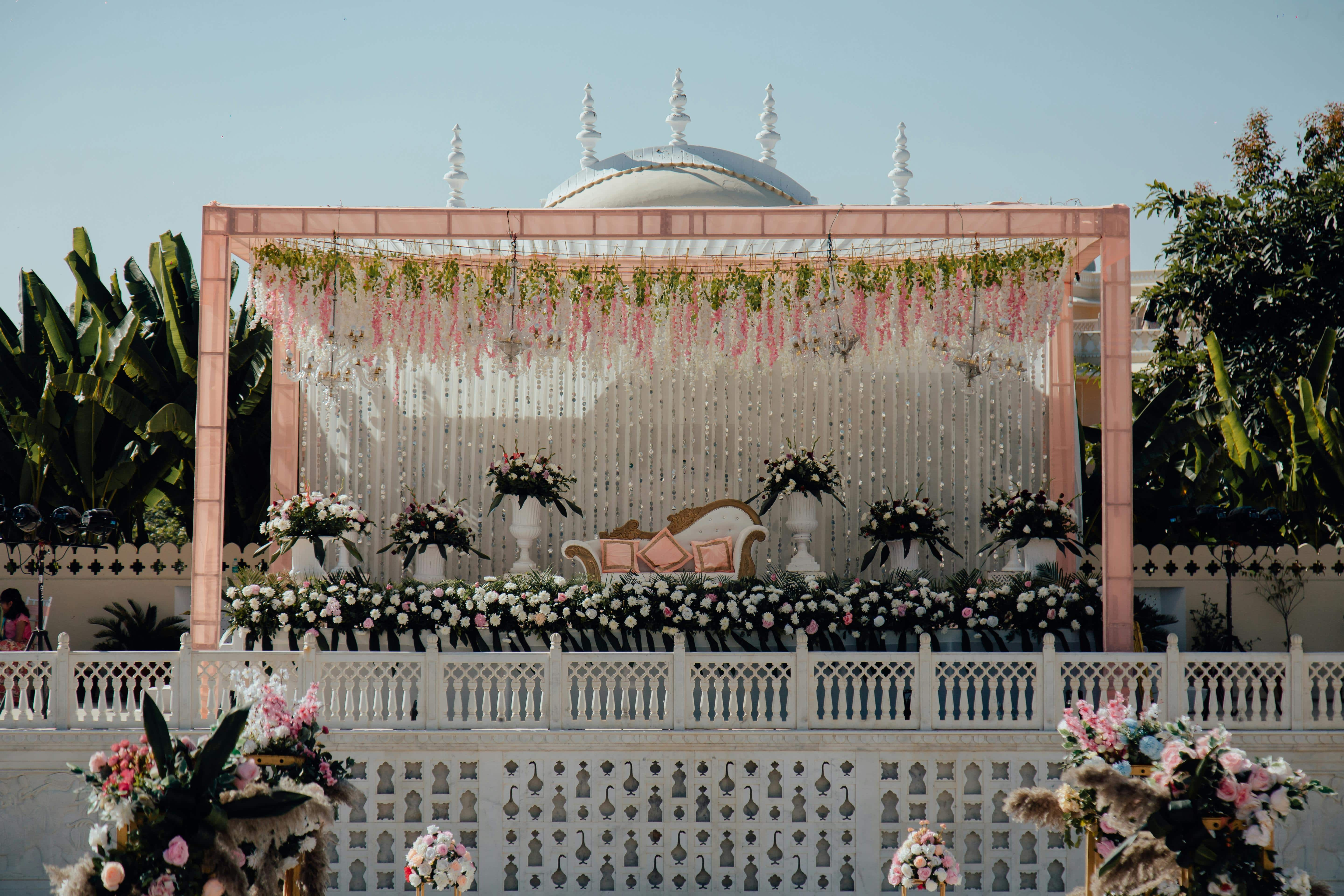 Luxury event decoration with premium floral arrangements and lighting design